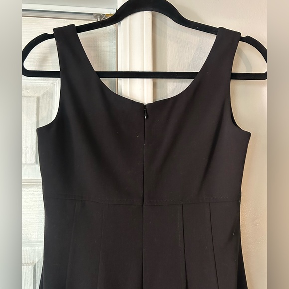 Aysha women’s black fitted dress. Sz 0. NWT. Ruffle at bottom hem. Scoop neck. - Picture 5 of 9